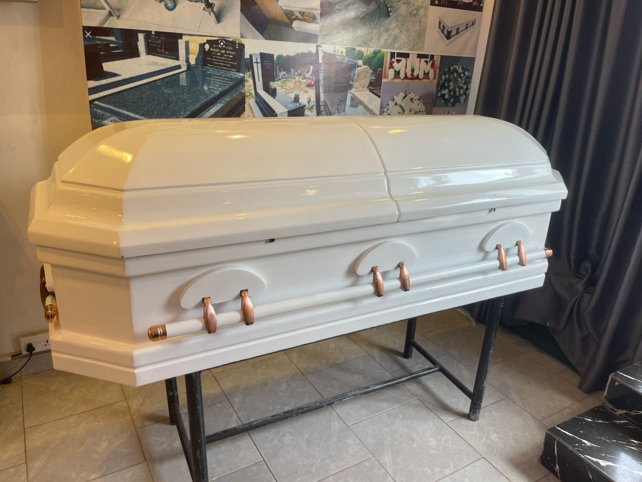 Gloss white casket with rose-gold handles
